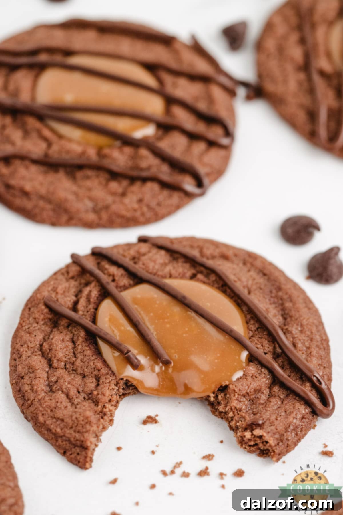 Close-up of chocolate cookies generously filled with creamy caramel