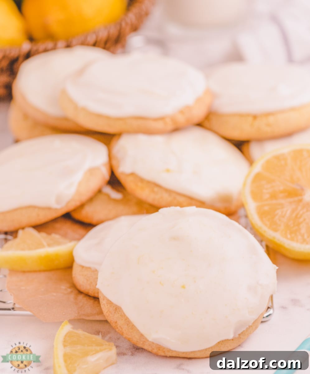 Soft and tangy Lemon Cake Mix Cool Whip Cookies with a simple lemon glaze.
