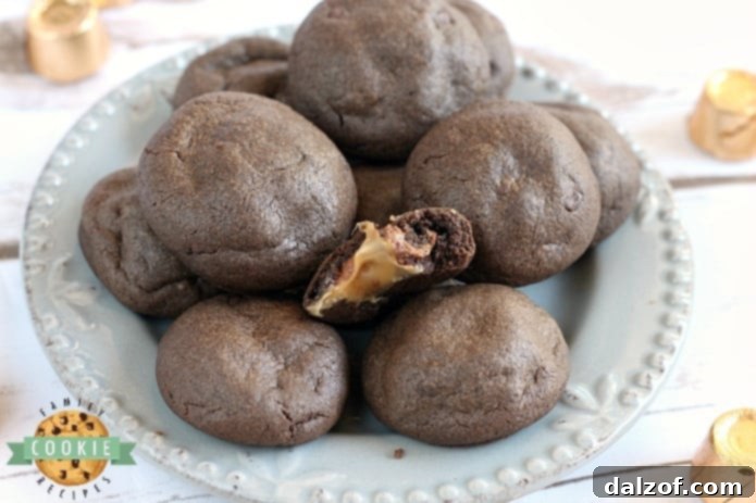 Easy Chocolate Caramel Cake Mix Cookies with a gooey Rolo candy in the center.