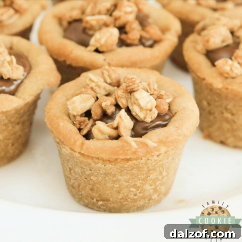 Irresistible Peanut Butter Cookies 13 Easy Chocolate Peanut Butter Cookie Cups made with only 5 ingredients, filled with creamy peanut butter and chocolate layers, and topped with crunchy granola.