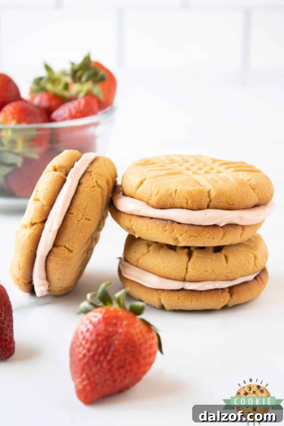 A batch of freshly baked Peanut Butter Cookie Sandwiches arranged neatly, showcasing their delightful appearance.