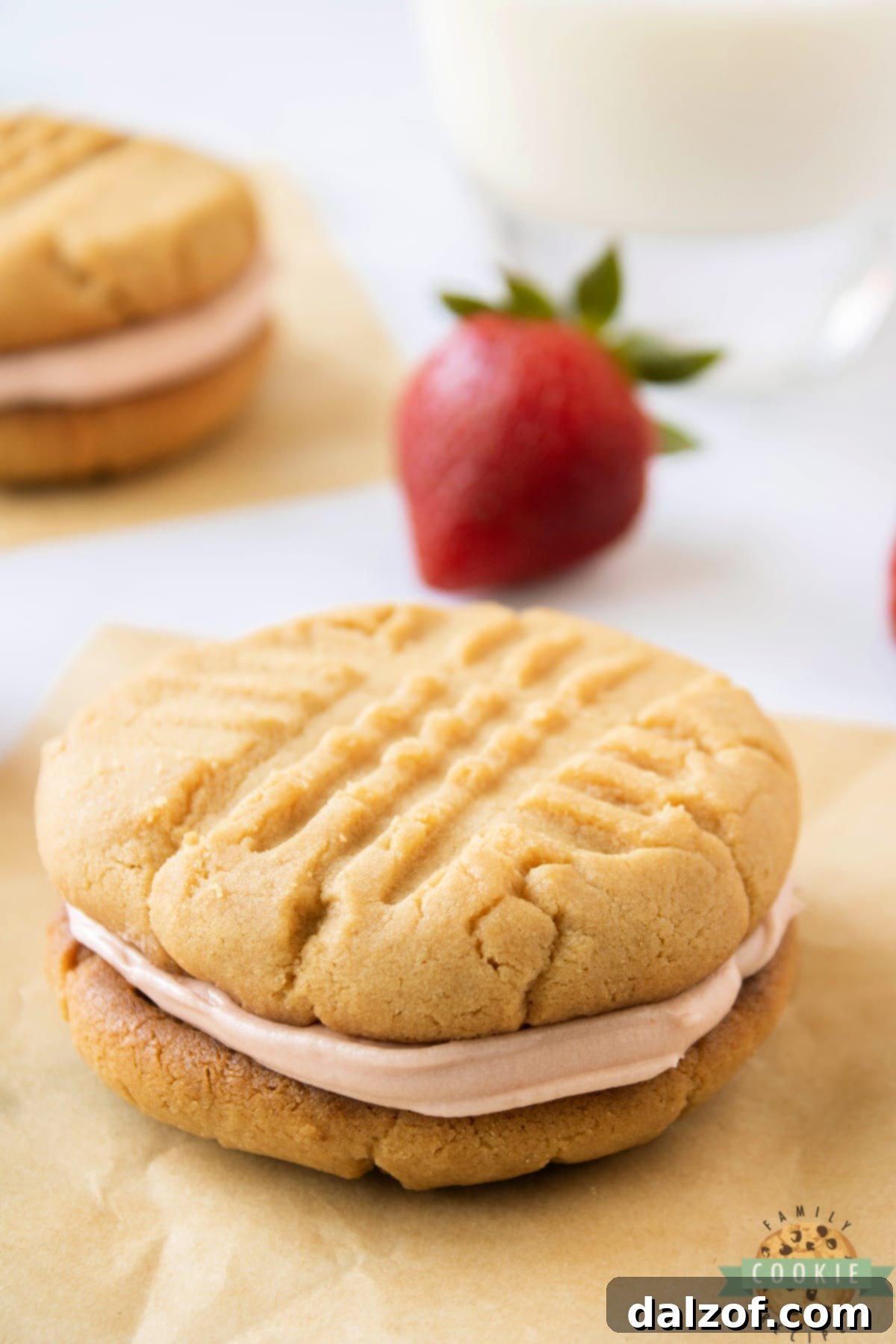Stacked Peanut Butter and Jelly Cookie Sandwiches, showcasing their soft texture and generous filling.