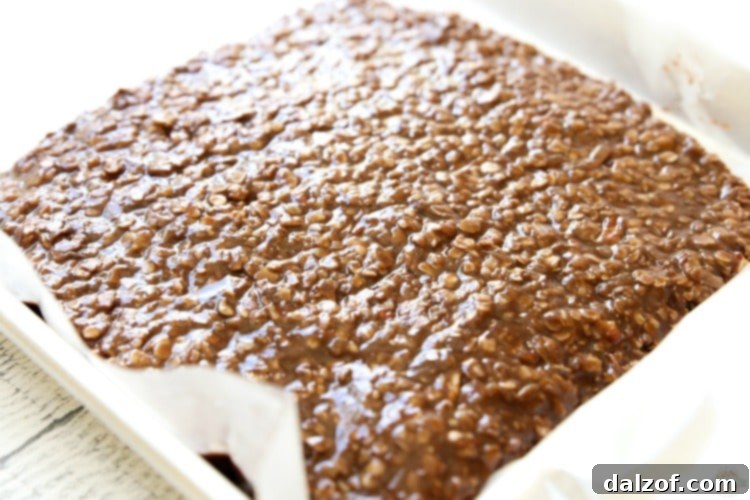 Cooling the No Bake Cookie Bars on a prepared sheet