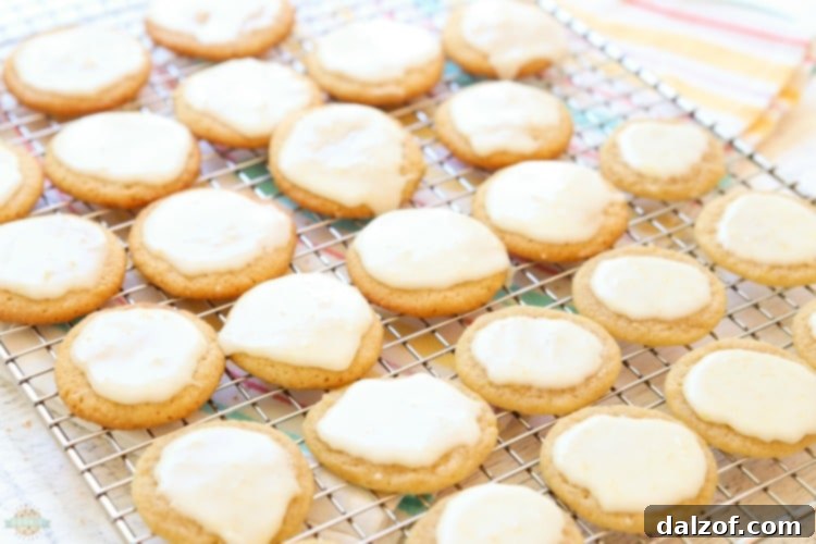 Freshly baked lemon cookies on a cooling rack