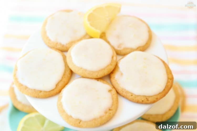 Iced lemon dessert cookies on a white plate