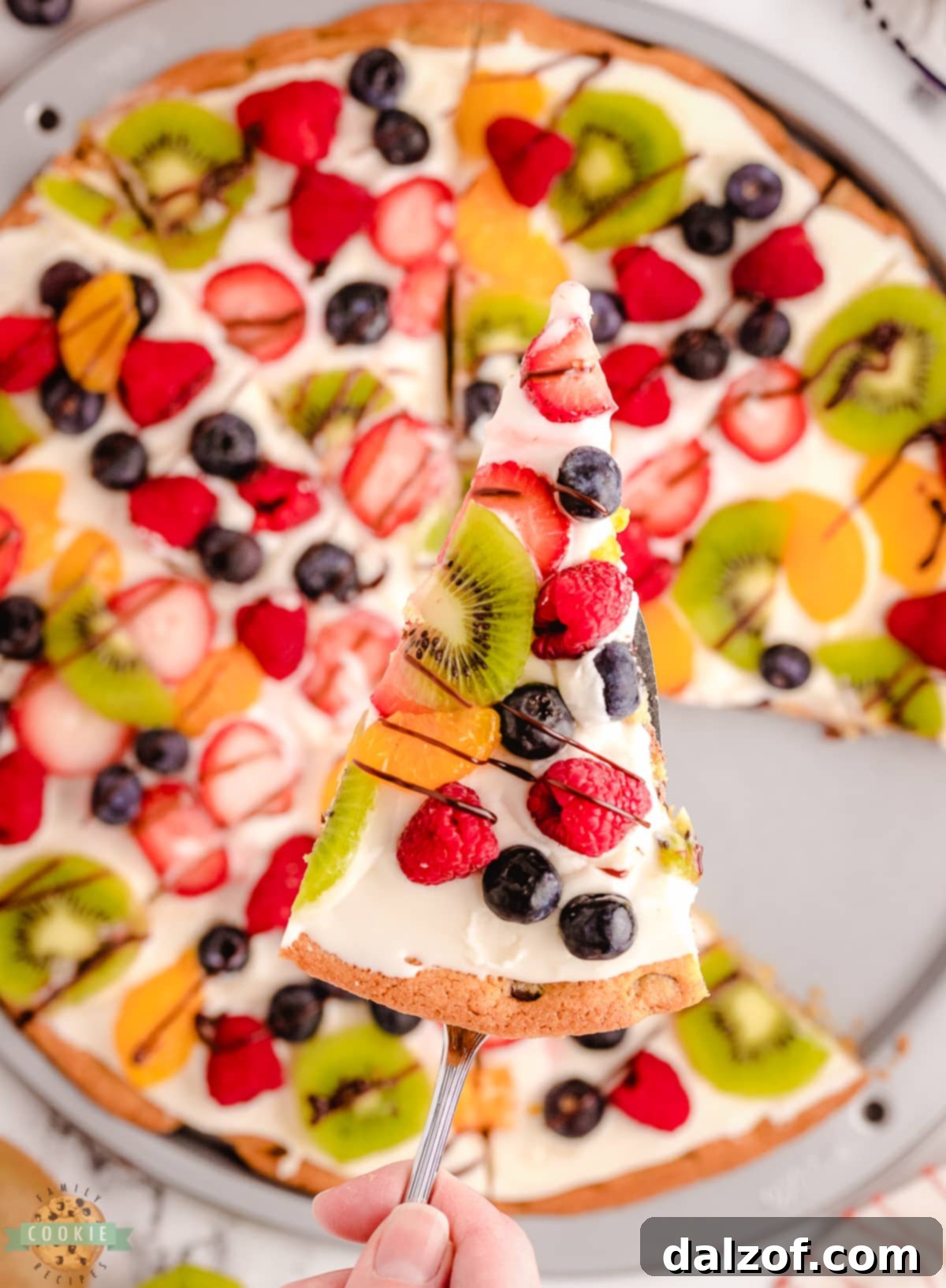serving up a slice of cookie pizza