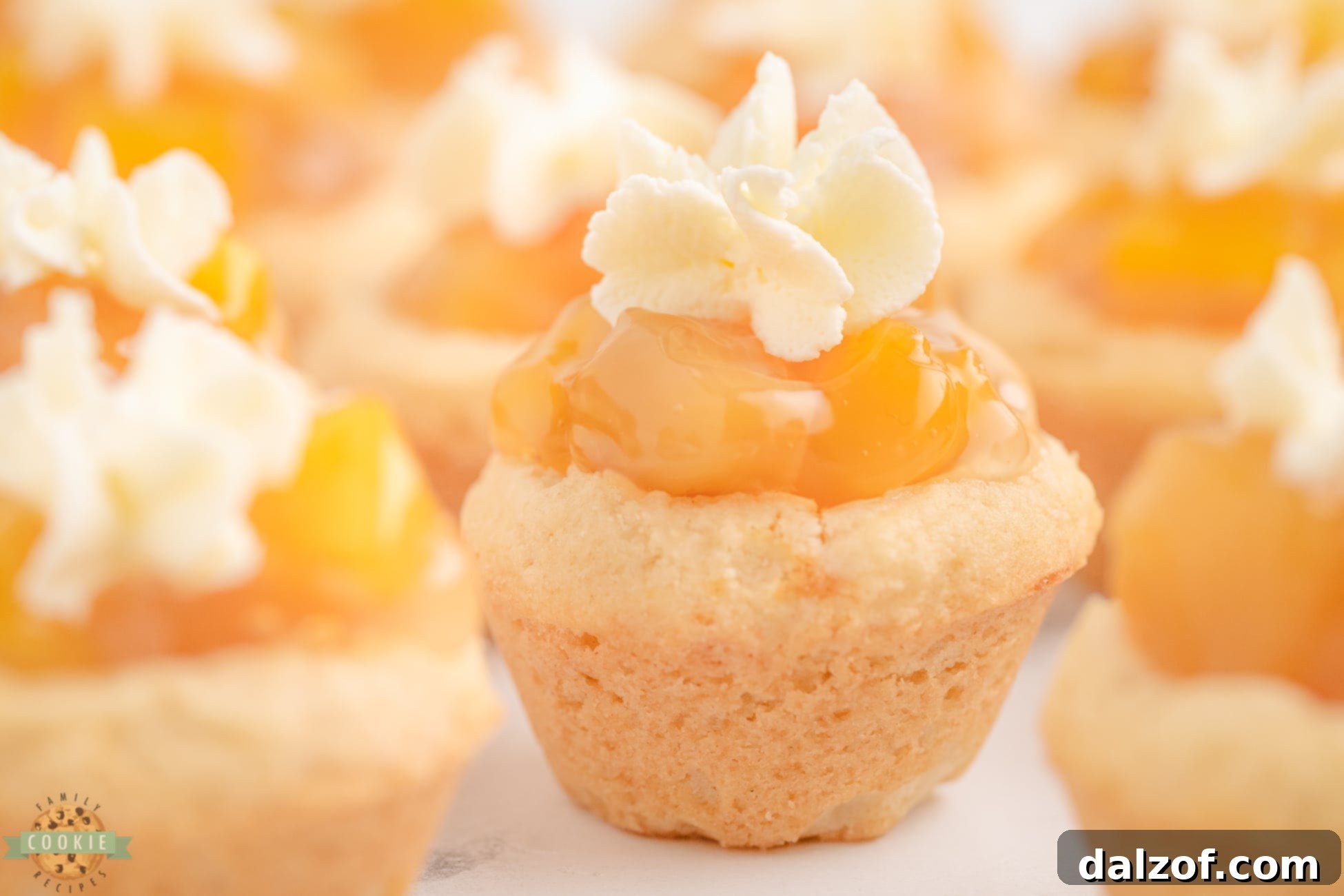 A tray of mini peach cobbler cookies, artfully arranged, highlighting their rustic charm and golden-brown perfection.