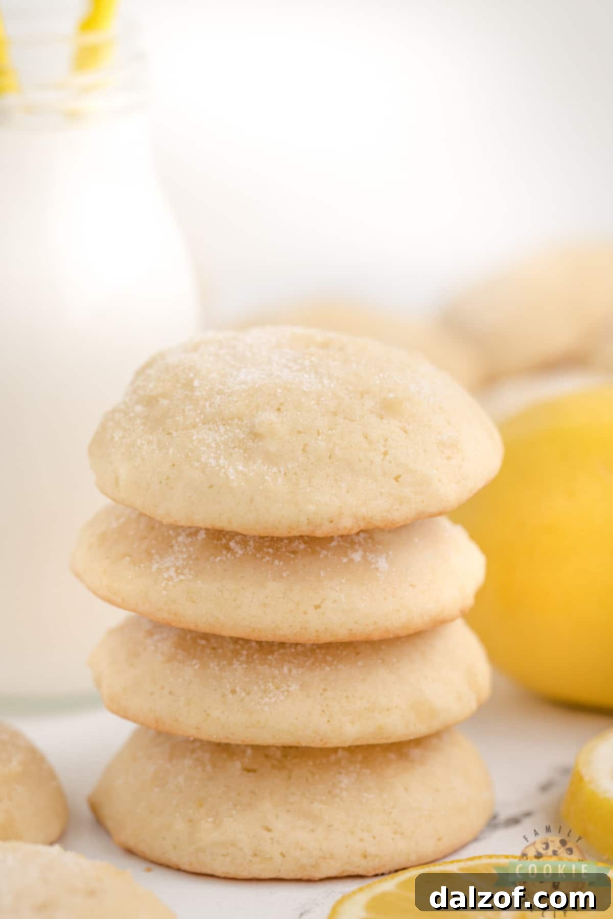 A plate of freshly baked Easy Lemonade Cookies, perfectly golden and dusted with sugar, inviting a taste.