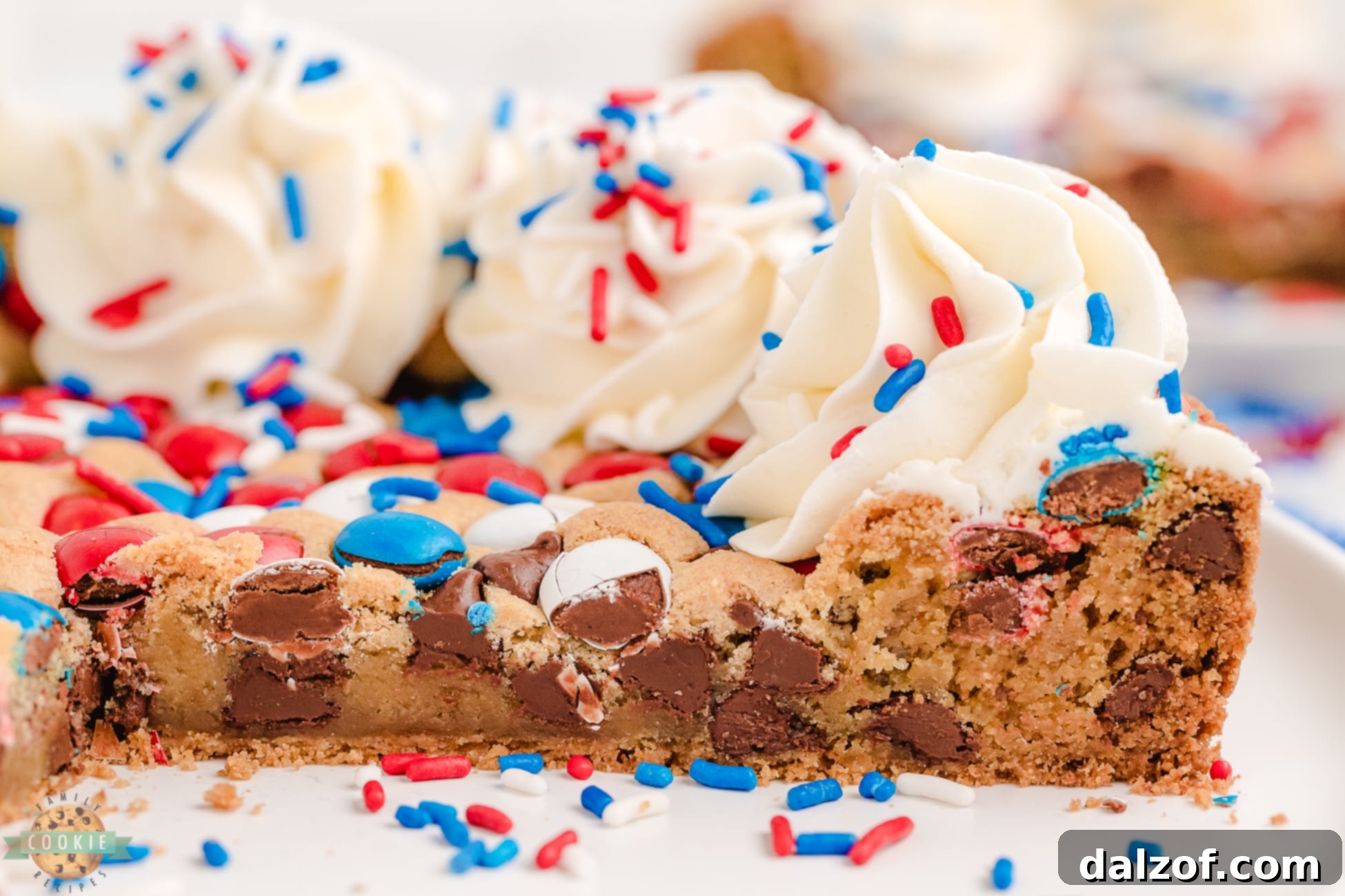 side angel of a slice of red, white and blue cookie cake