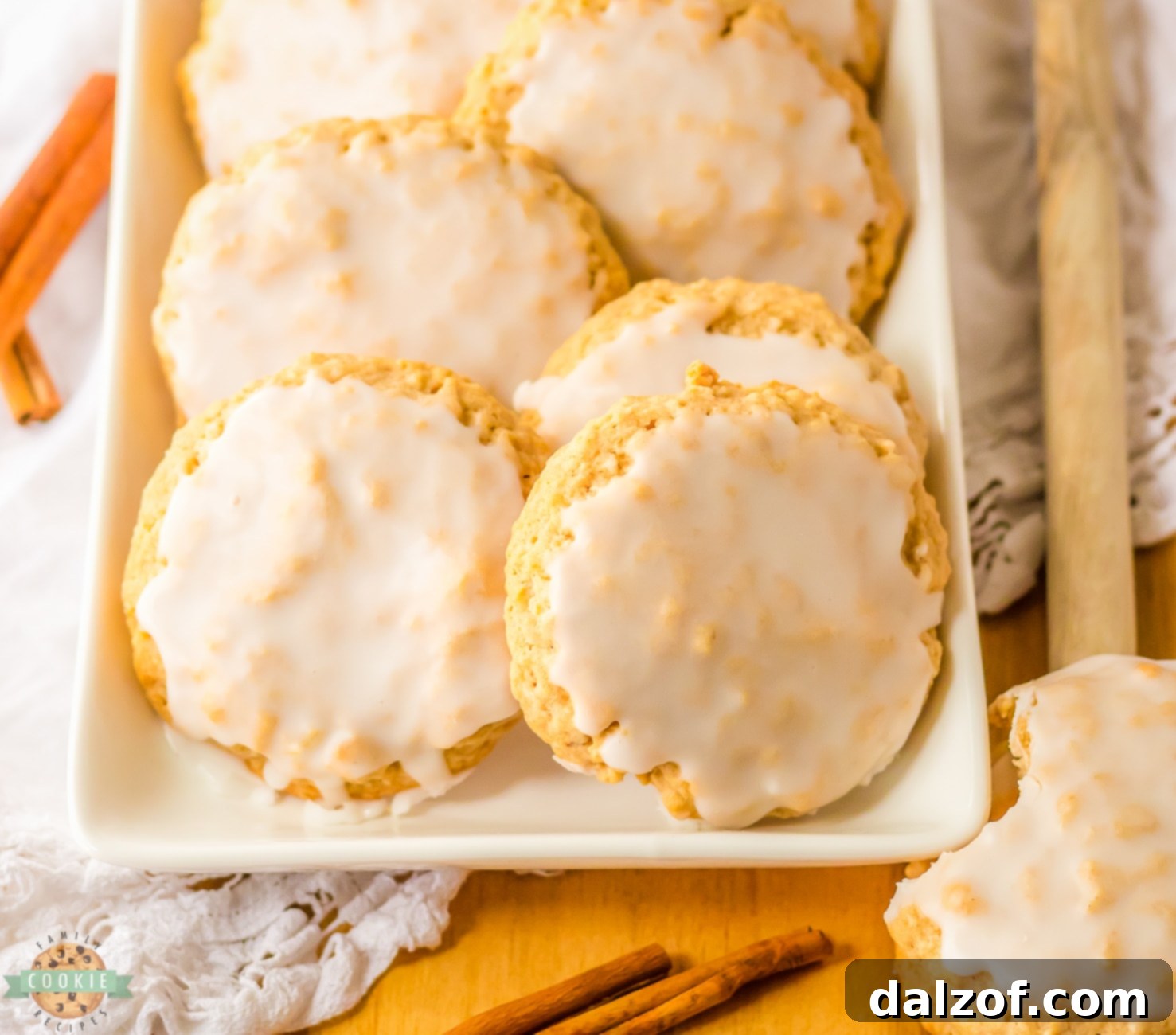 Luscious Frosted Oatmeal Chews 6 Lightly iced oatmeal cookies arranged on a white serving tray