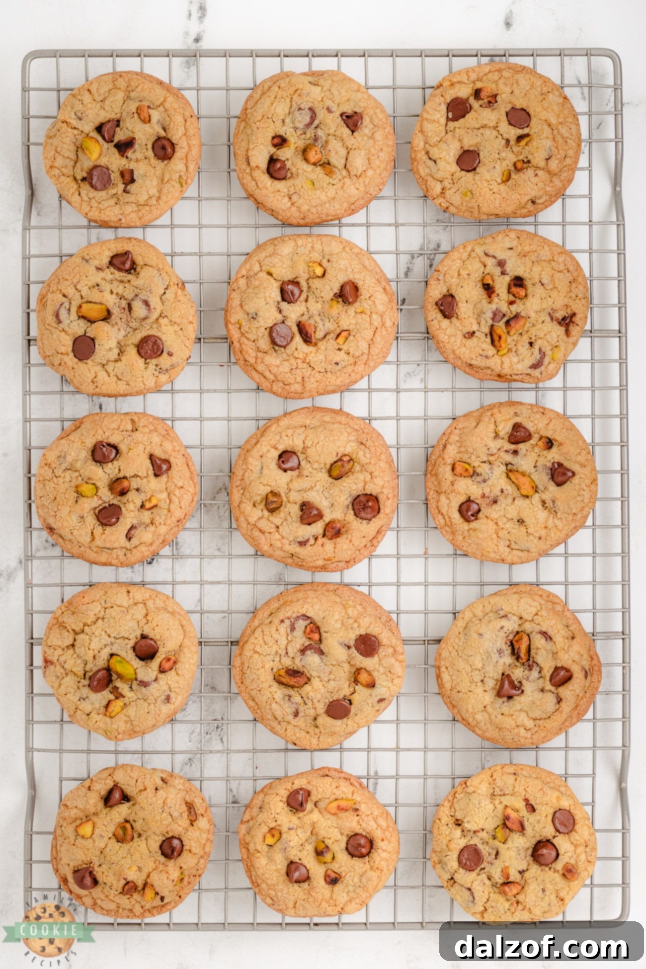 toasted pistachio cookies on a cooling rack