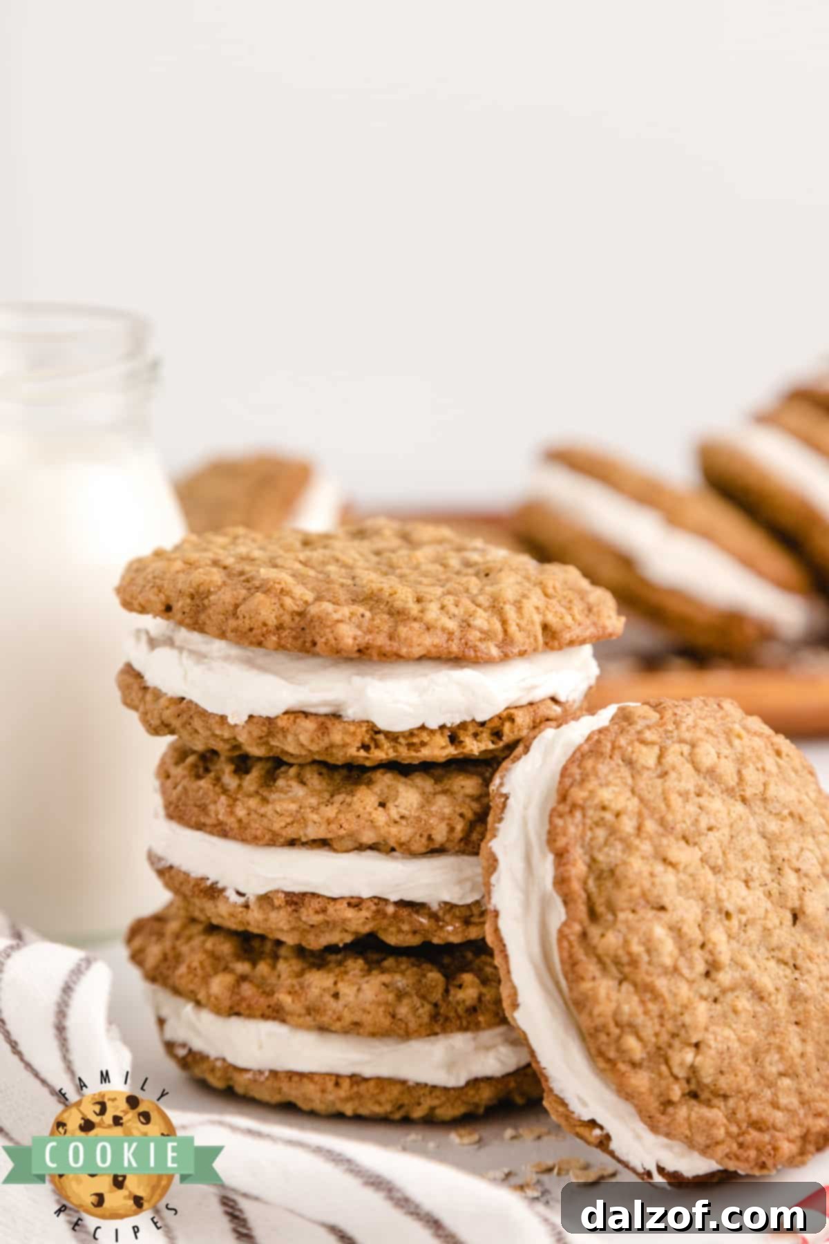 Homemade oatmeal cream pies with soft, spiced oatmeal cookies and creamy marshmallow buttercream filling