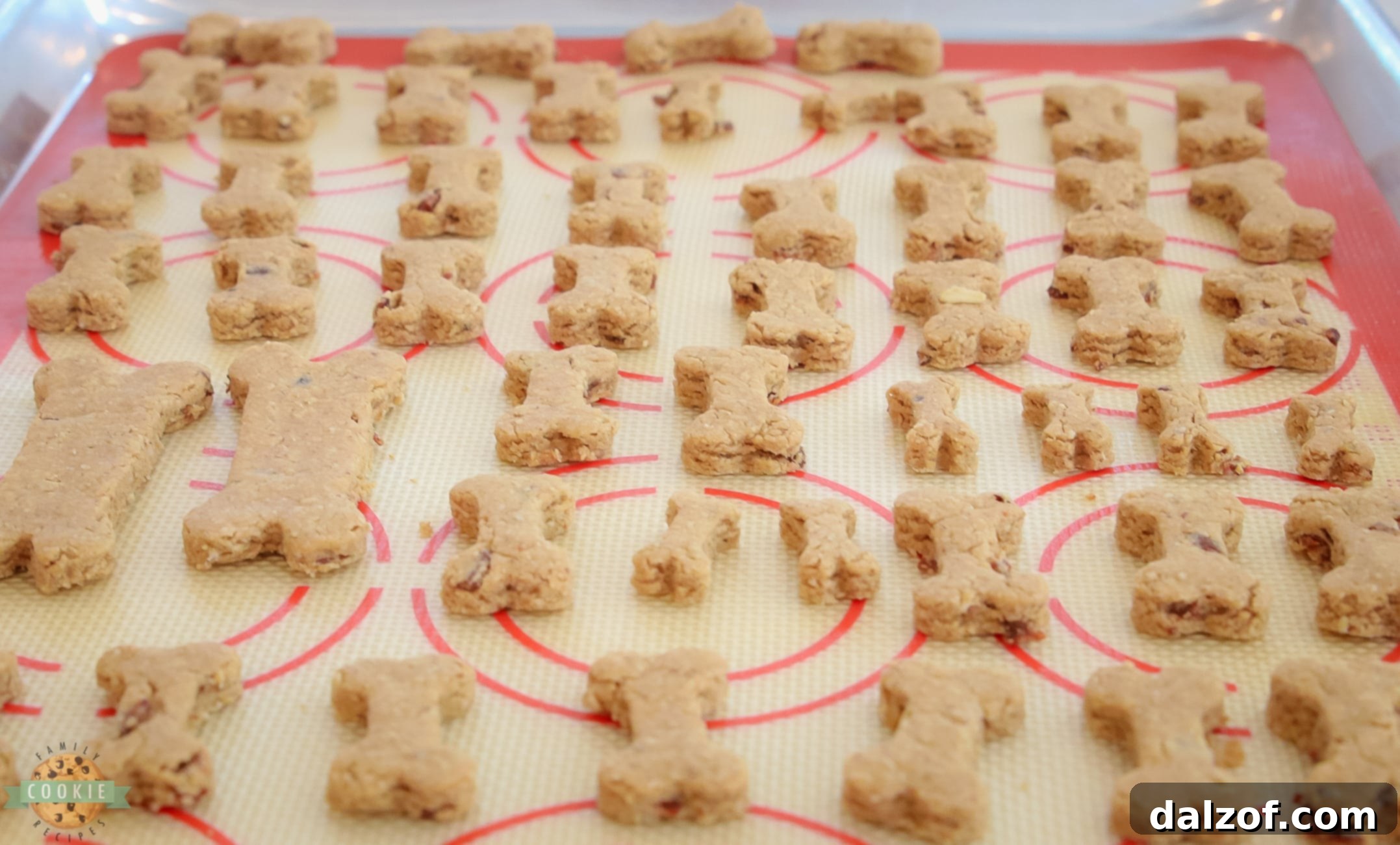 Tail-Wagging Peanut Butter Bacon Treats 7 Homemade dog biscuits cooling on a silpat mat