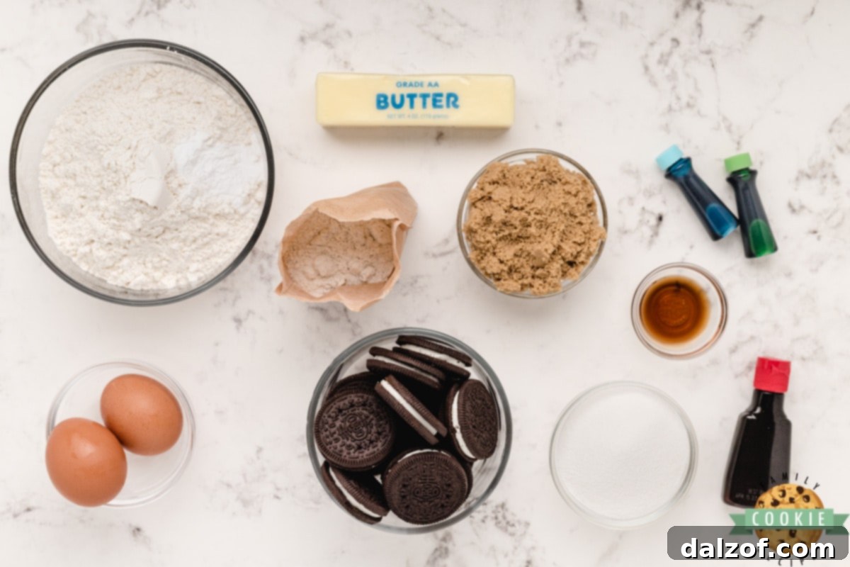 Close-up of ingredients for Mint Oreo Pudding Cookies including butter, sugars, pudding mix, and Oreos
