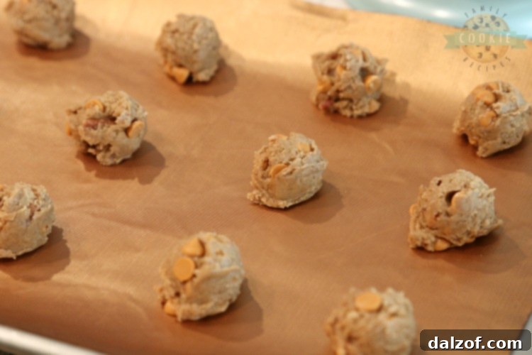 Close-up of caramel pecan spice cake mix cookie dough ready to be baked.