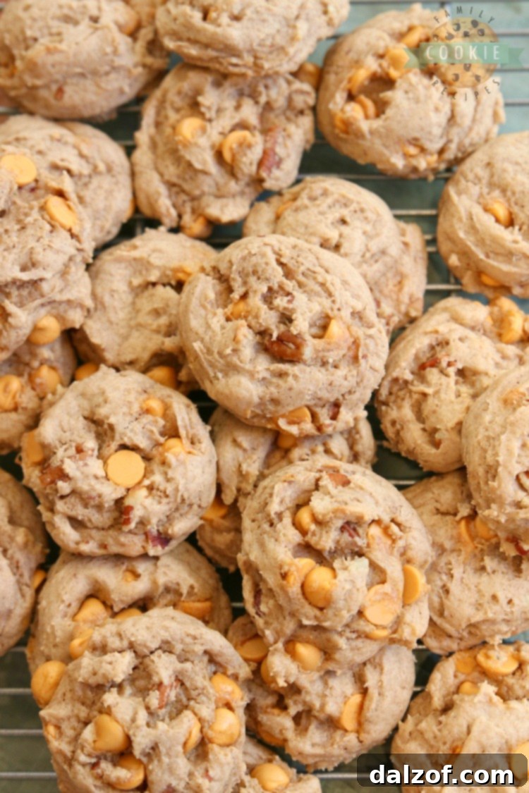 Baked caramel pecan spice cake mix cookies cooling on a wire rack.