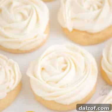 Frosted lemon rosettes adorning sugar cookies
