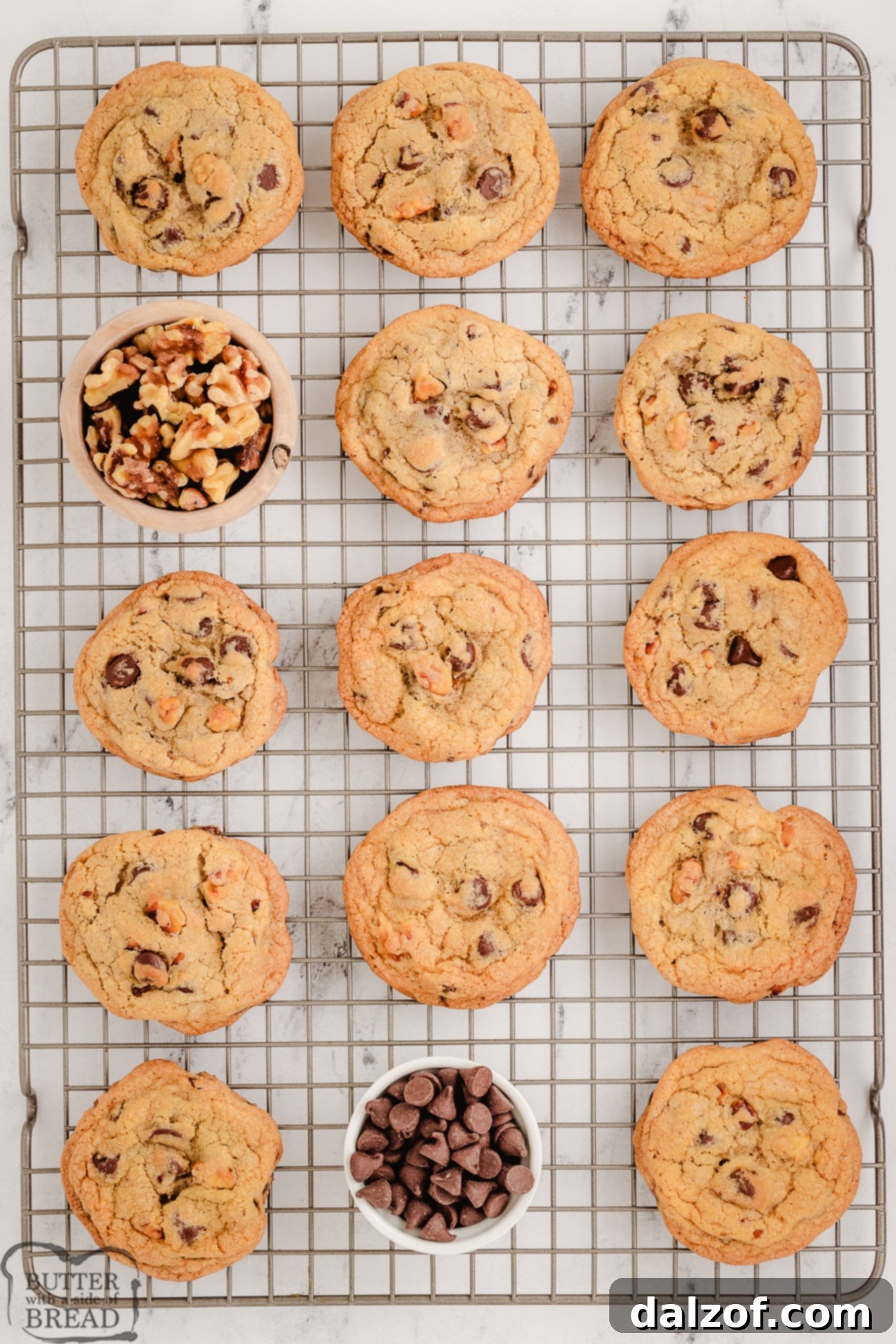 Gourmet Toasted Walnut Chocolate Chip Cookies 5 Freshly baked toasted walnut chocolate chip cookies cooling on a wire rack.