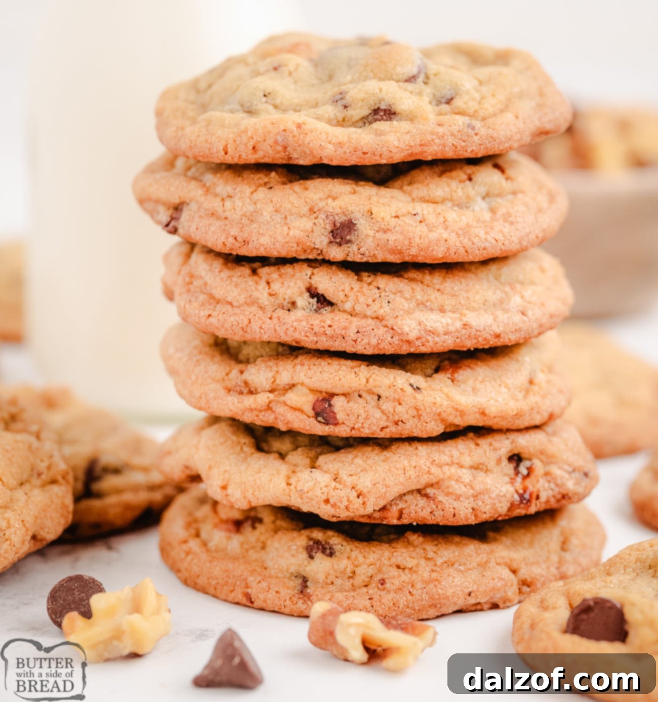 Gourmet Toasted Walnut Chocolate Chip Cookies 7 A perfectly stacked pile of Toasted Walnut Chocolate Chip Cookies, inviting a delicious bite.
