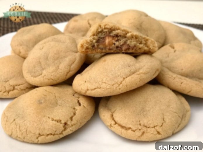 Top view of Snickers Peanut Butter Cookies showcasing the gooey candy center