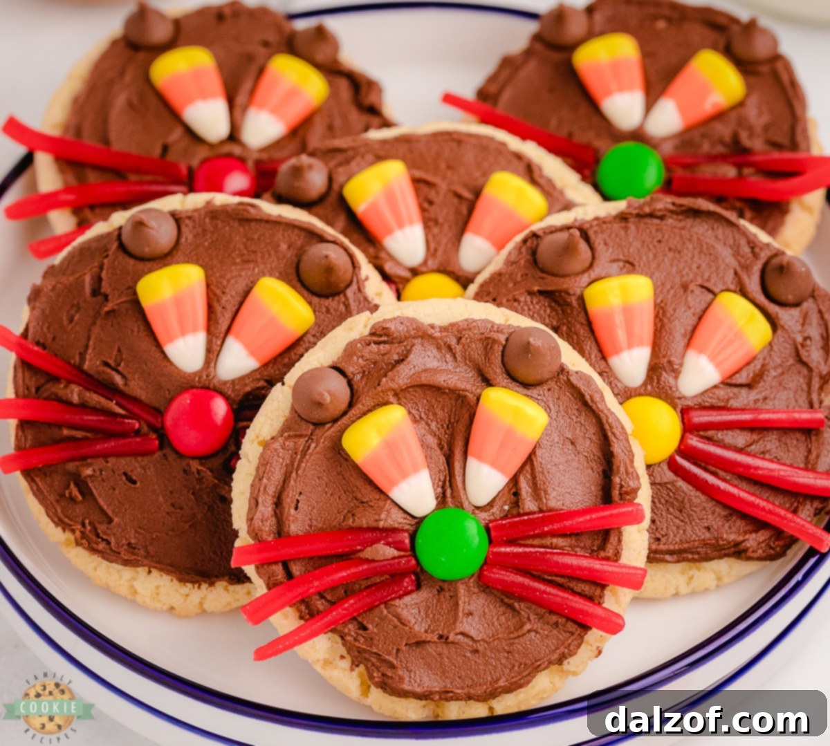 Cute Halloween Cat Cookies with chocolate frosting and candy eyes