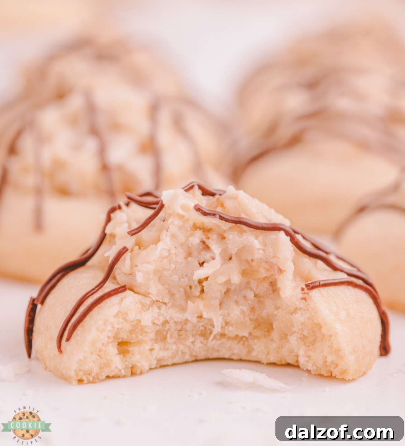 bite taken out of coconut cream cookies