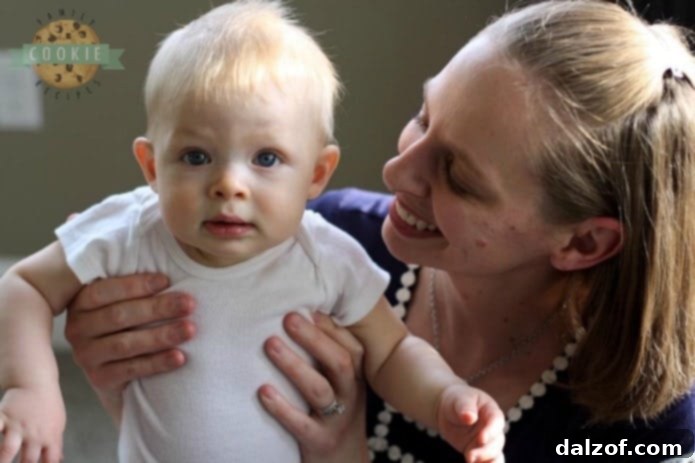 a sweet flashback photo of baby A, a child smiling