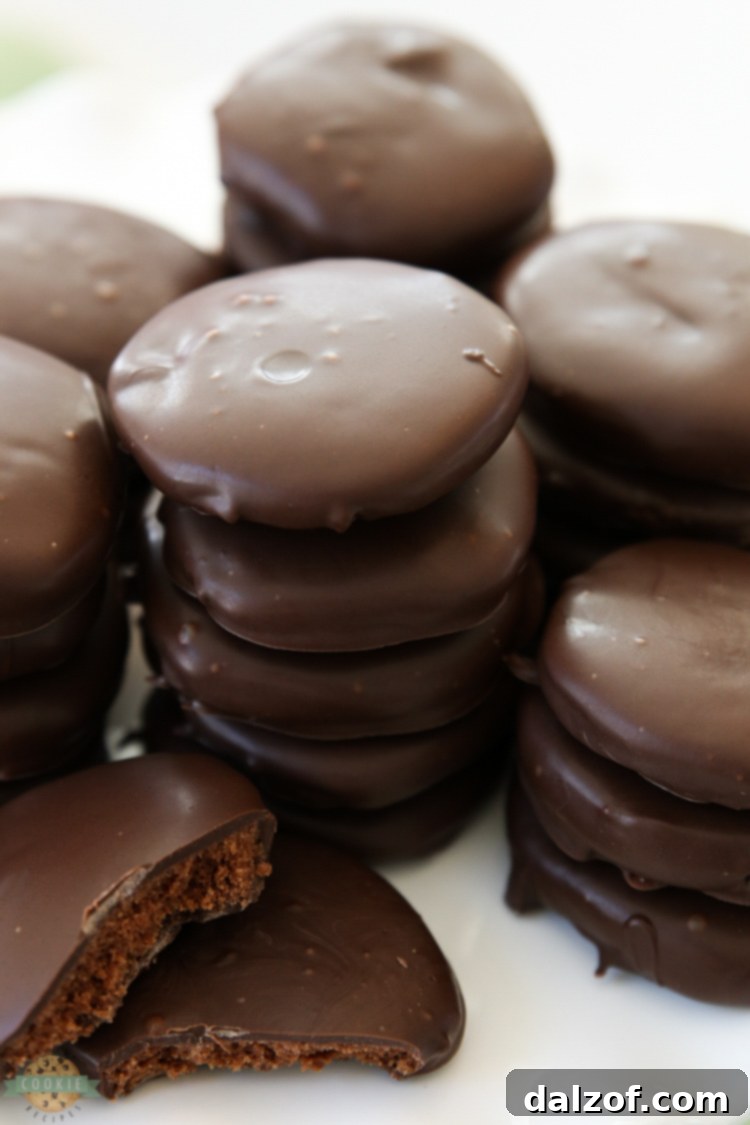 Thin Mints Cookies made with homemade buttery chocolate cookies dipped in mint fudge glaze. This simple recipe for copycat Thin Mints tastes even better than the original!