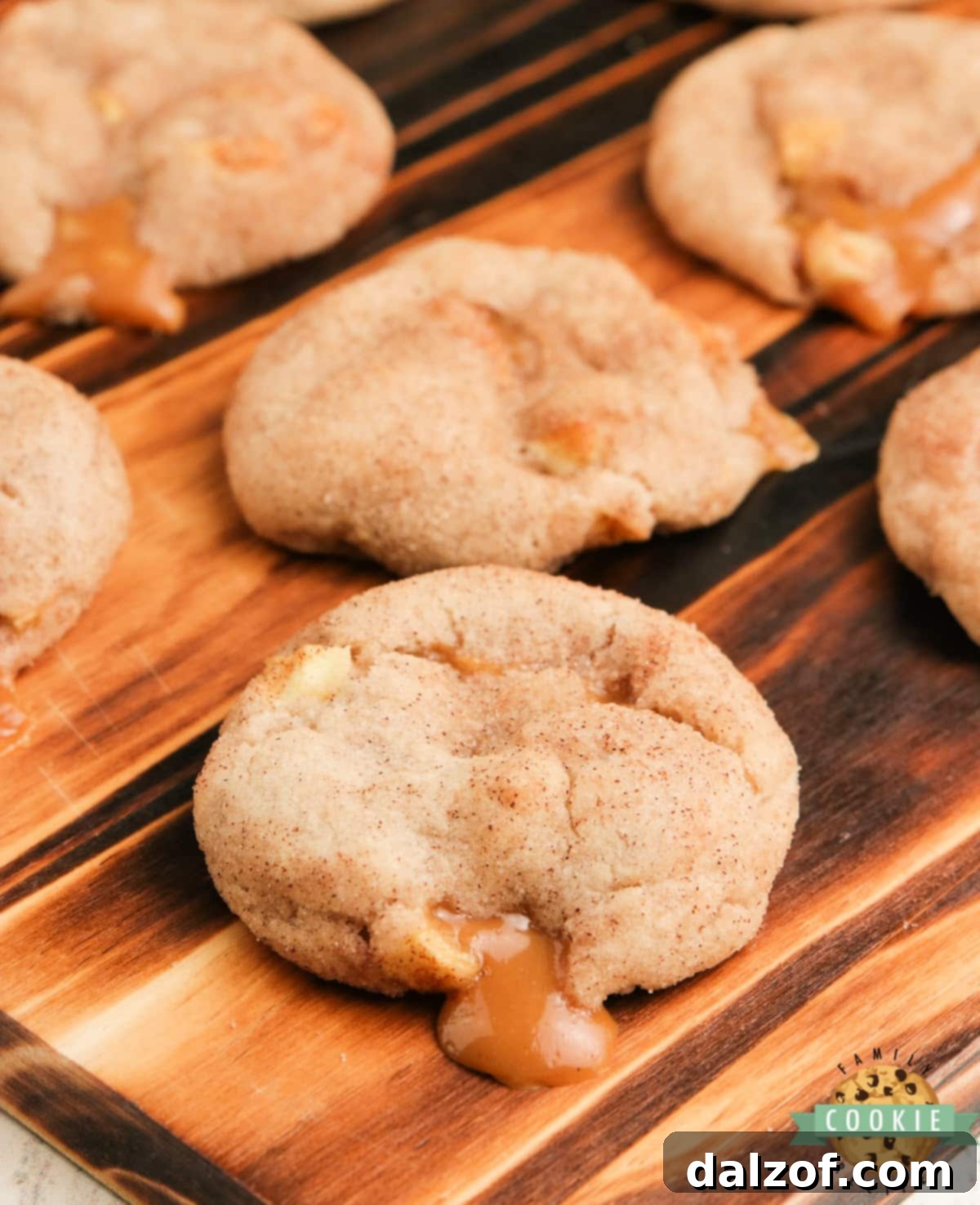 Irresistibly soft and chewy Caramel Apple Snickerdoodles, bursting with fresh apples and a gooey caramel center, perfect for fall baking and holiday gatherings.