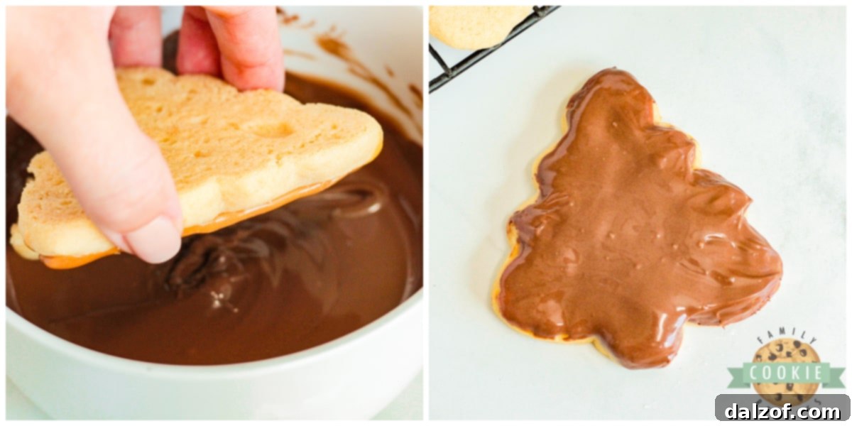 Dipping cookies in melted chocolate. 