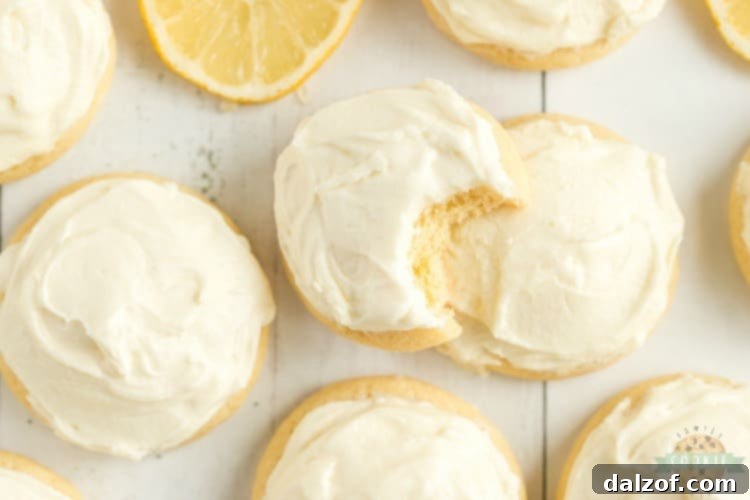 Frosted Lemon Jello Sugar Cookies with bright yellow frosting