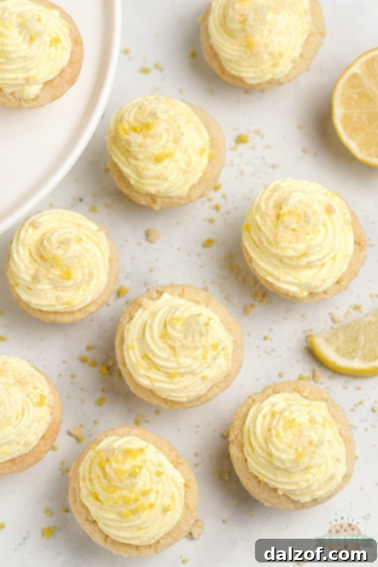 Lemon cream pie cookies are a delicious way to enjoy the tastes of a lemon cream pie without the hassle of pie crust. These lemon cookie cups are easy to grab and go and this lemon cookie recipe makes enough to share.