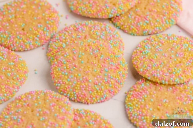 An inviting plate of Easter sprinkle cookies, perfect for holiday gatherings and sharing.