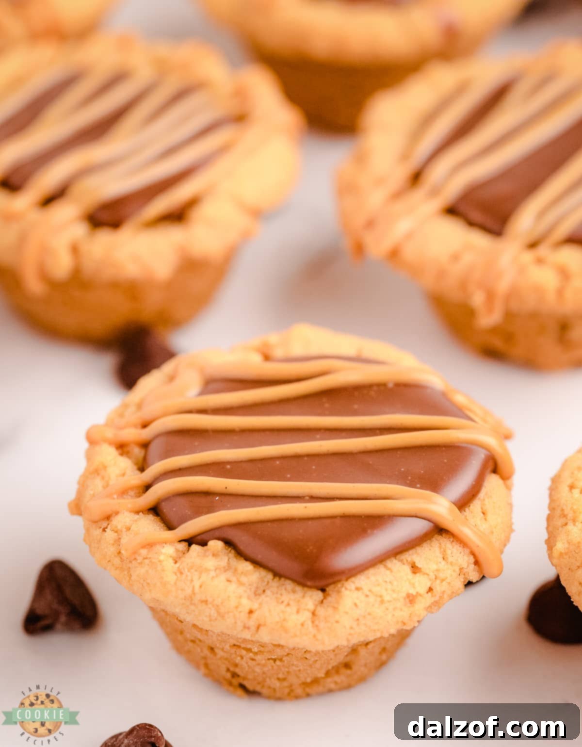 Close-up of fudge-filled cookie cups arranged on a cooling rack