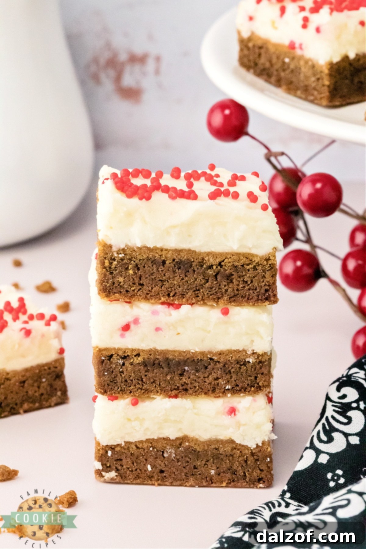 Thick and soft Gingerbread Cookie Bars with cream cheese frosting.