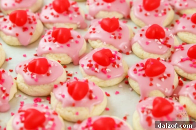 Freshly baked Valentines Cake Mix Cookies cooling on a rack