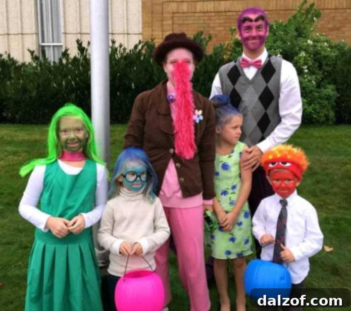 Family dressed in Inside Out Halloween costumes