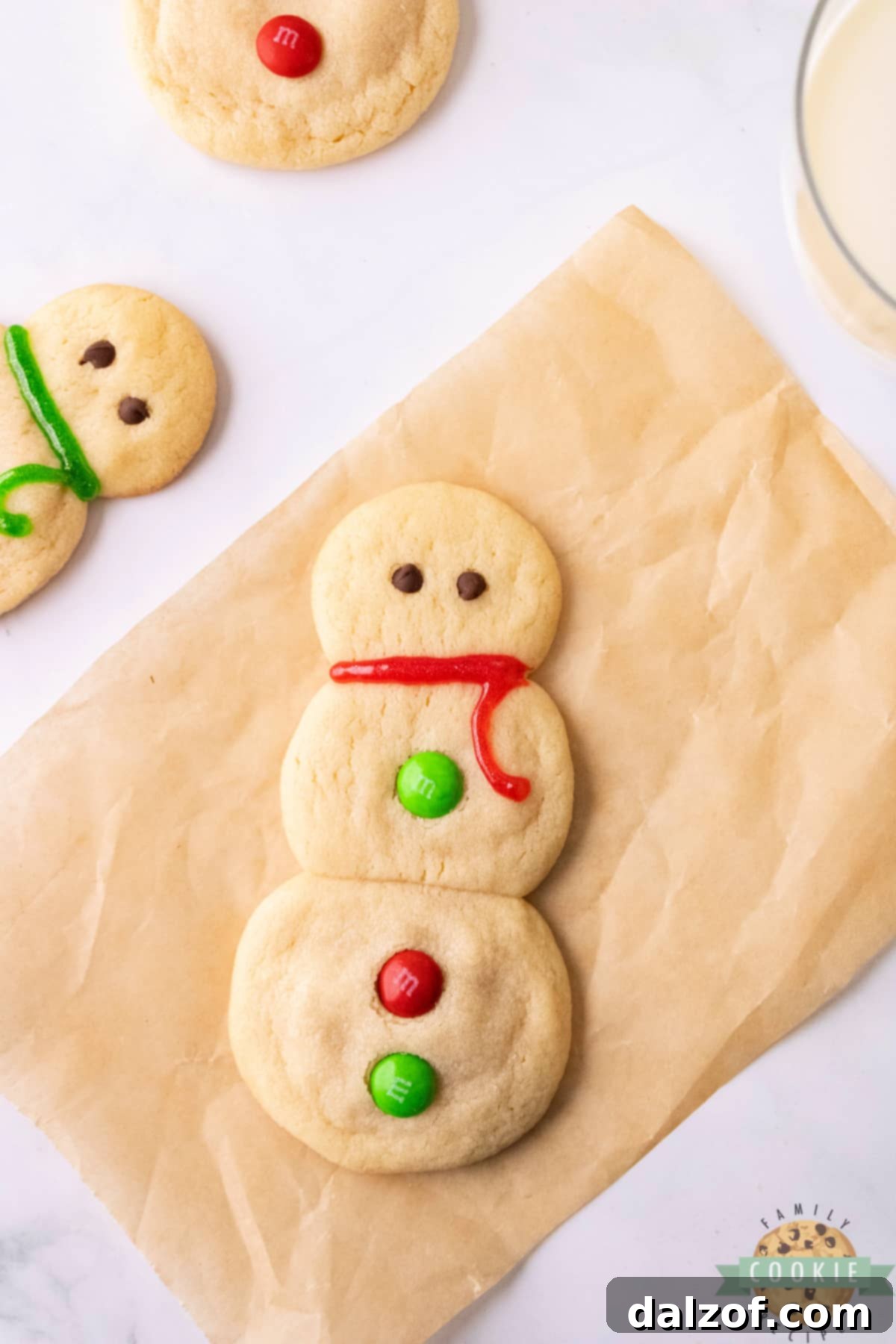 A beautifully decorated snowman sugar cookie, ready for holiday festivities.