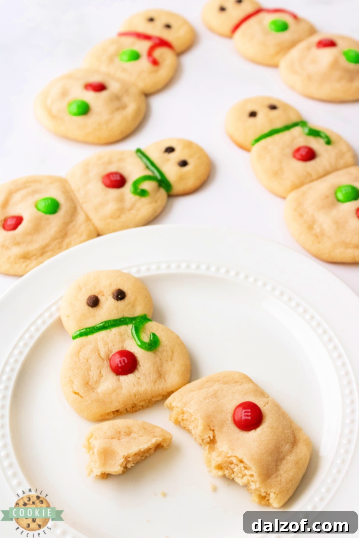 A festive scene of Snowman Sugar Cookies arranged beautifully for the holidays, showcasing their soft, chewy texture and rich vanilla flavor.