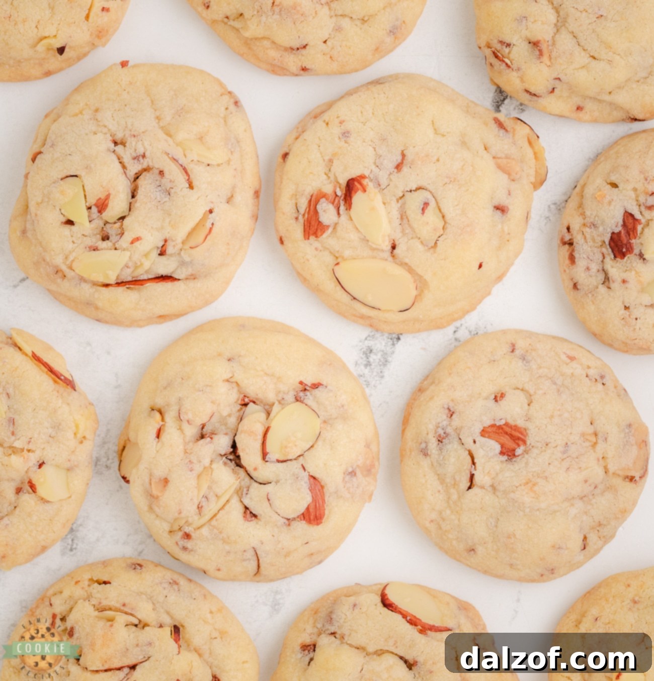 A tray filled with freshly baked Toffee Almond Sandies, ready to be enjoyed or stored.