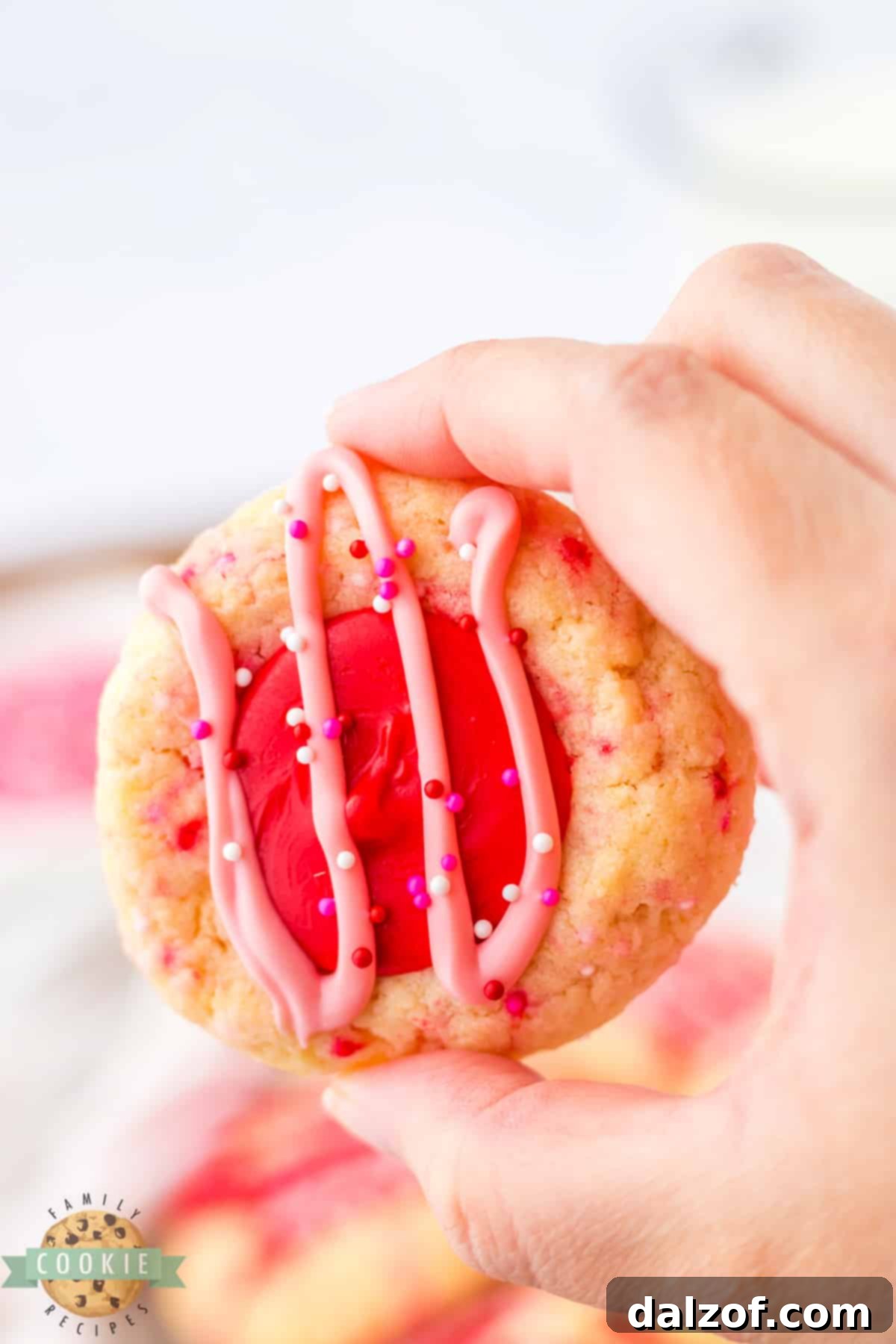 Cookie filled with melted red chocolate. 