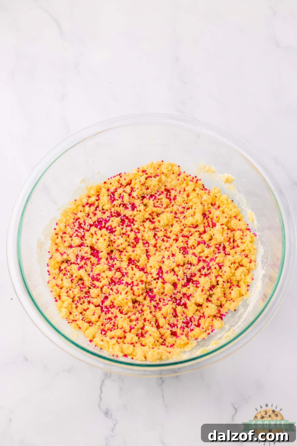 Add sprinkles to cookie dough.