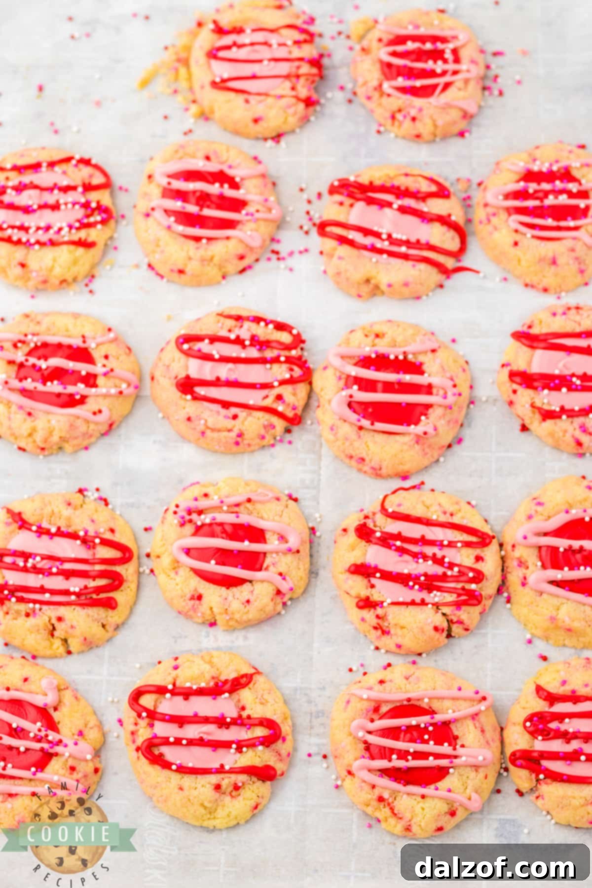 Adding drizzle and sprinkles to the cookies.