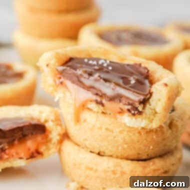 Delicious Twix Cookie Cups with caramel and chocolate.