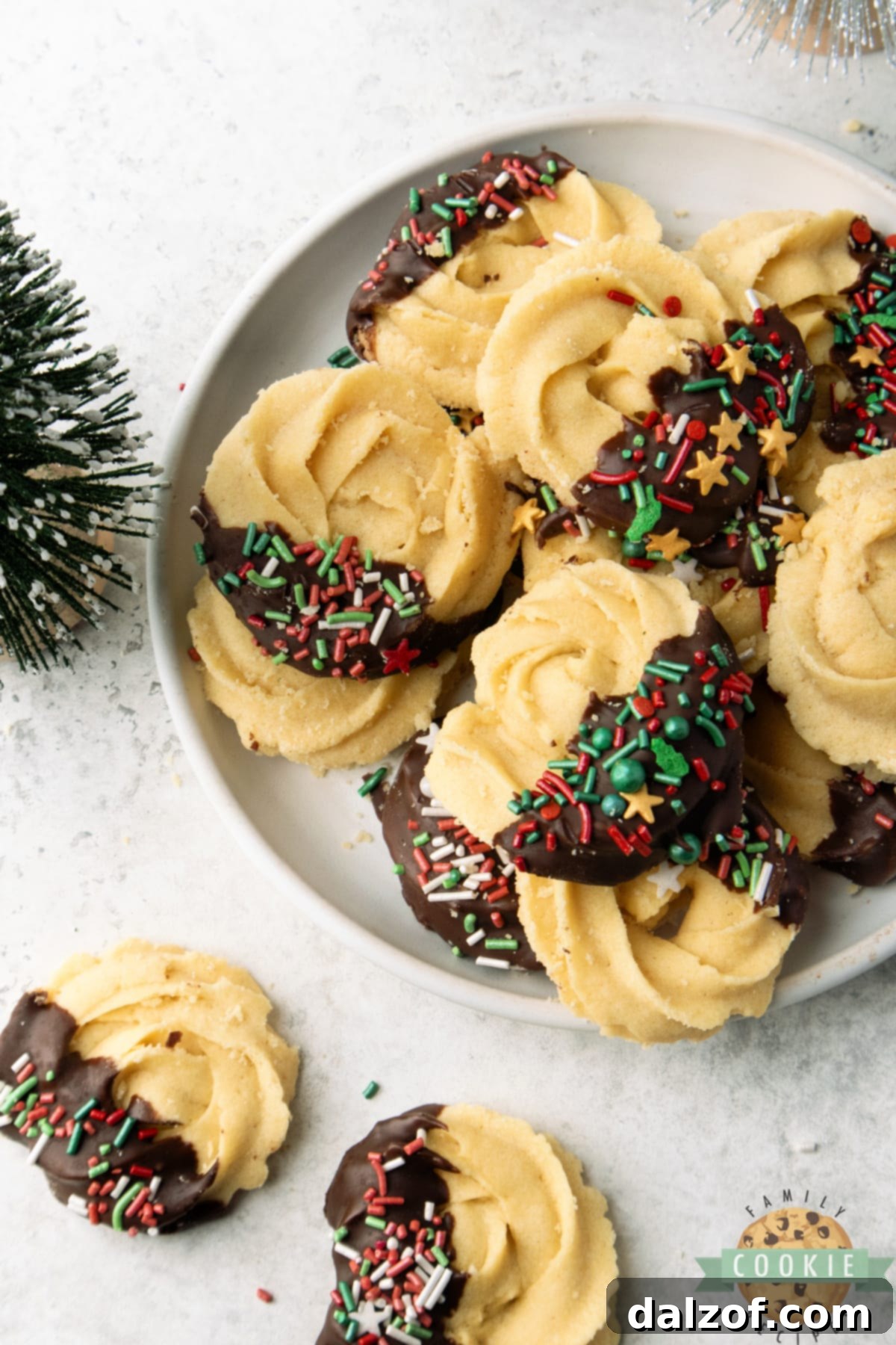 Butter cookies dipped in chocolate.