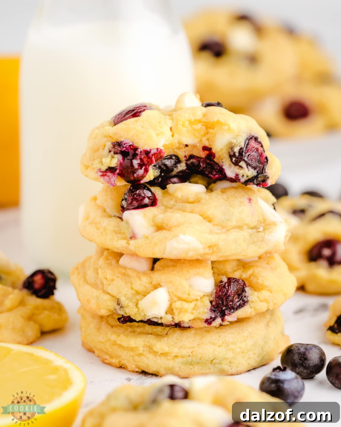 stack of lemon blueberries with a bite taken out