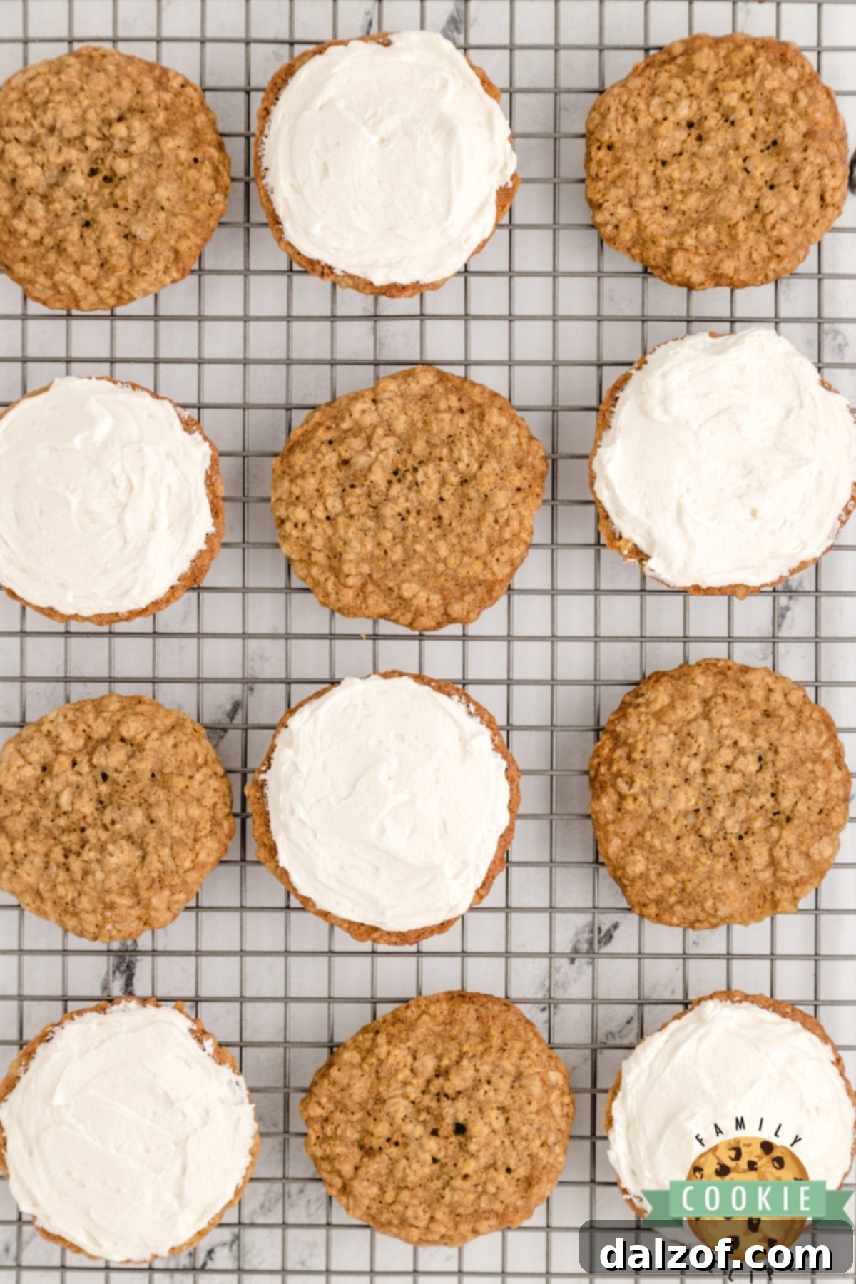 Placing the filling between 2 oatmeal cookies 