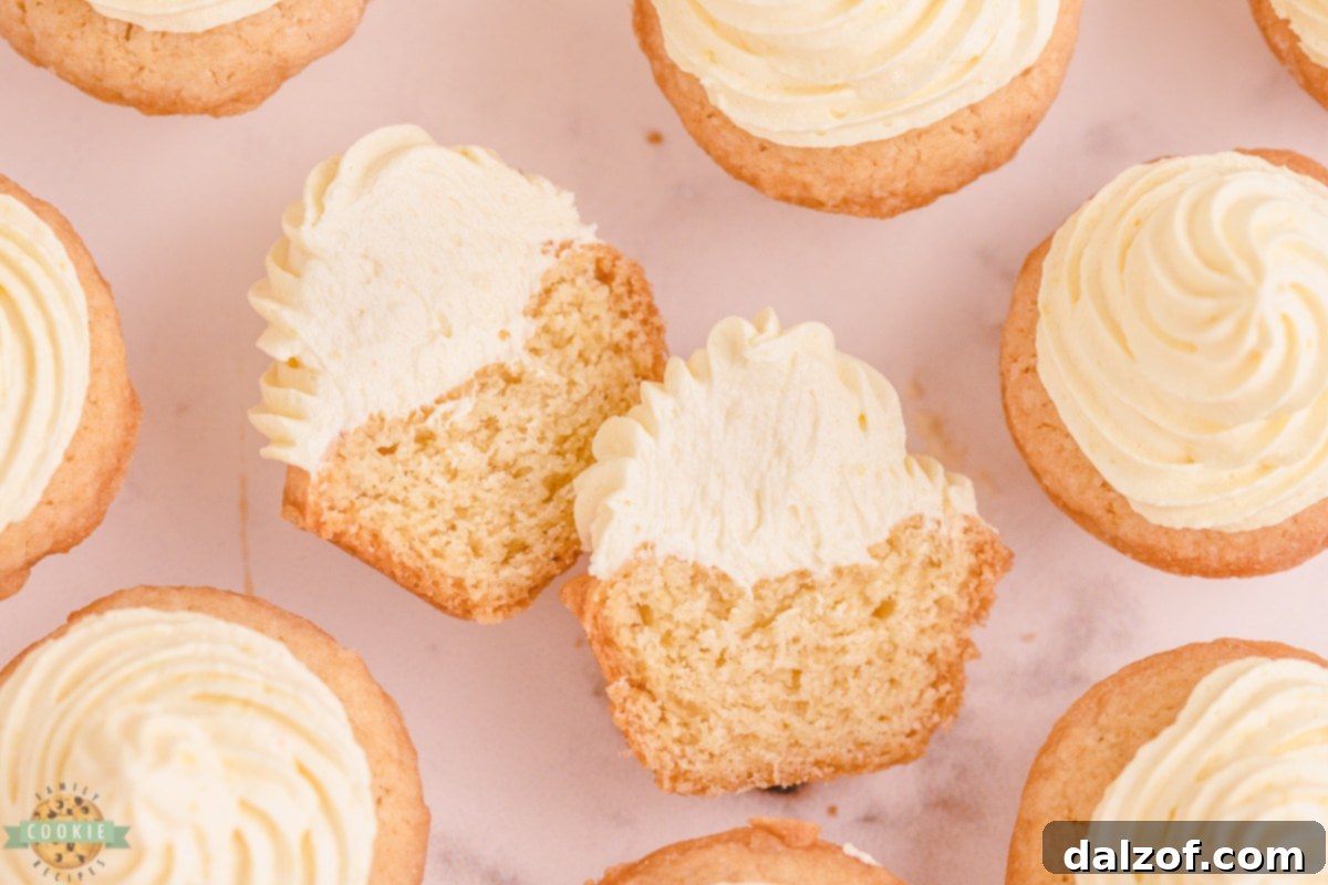 Banana Cream Dream Cookies 3 Close-up of banana cookies with a smooth, creamy filling and fresh banana topping