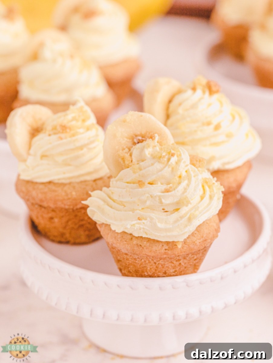 Banana Cream Dream Cookies 4 Making banana cream pie cookies by pressing a well into baked cookie cups in a mini muffin tin