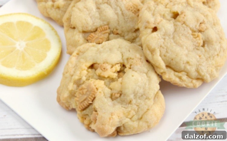 Soft and chewy Double Lemon Cookies made with instant lemon pudding mix and crunchy crushed Lemon Oreos for an explosion of delicious lemon flavor.